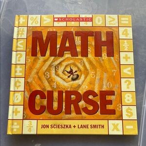 Scholastic Math Curse Book with Orange and Yellow hard Cover
